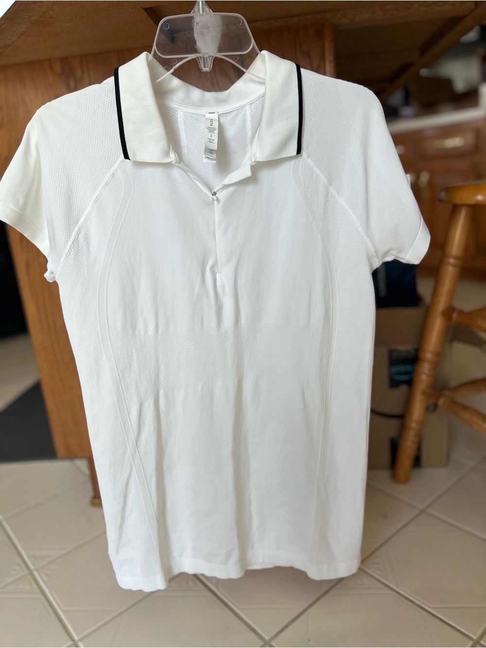 Athleta White Short Sleeve Polo with Black Collar Trim